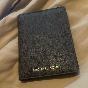 Michael Kora passport and wallet holder